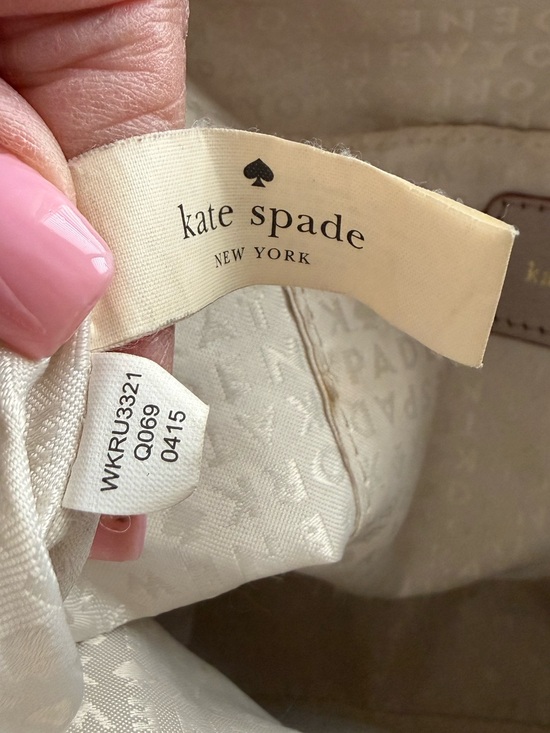 kate spade NEW YORK Ivory Pebbled Leather Hobo Tassel Zip Top Crossbody Bag